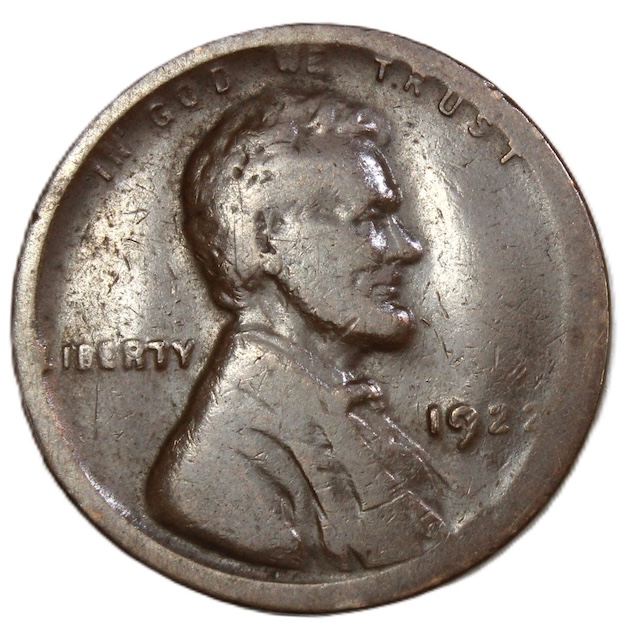 1922-D wheat penny off-center strike error showing crescent blank area and offset Lincoln portrait